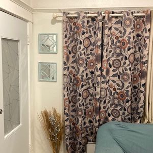 4 curtain flower print panels. With colors gray orange & tan